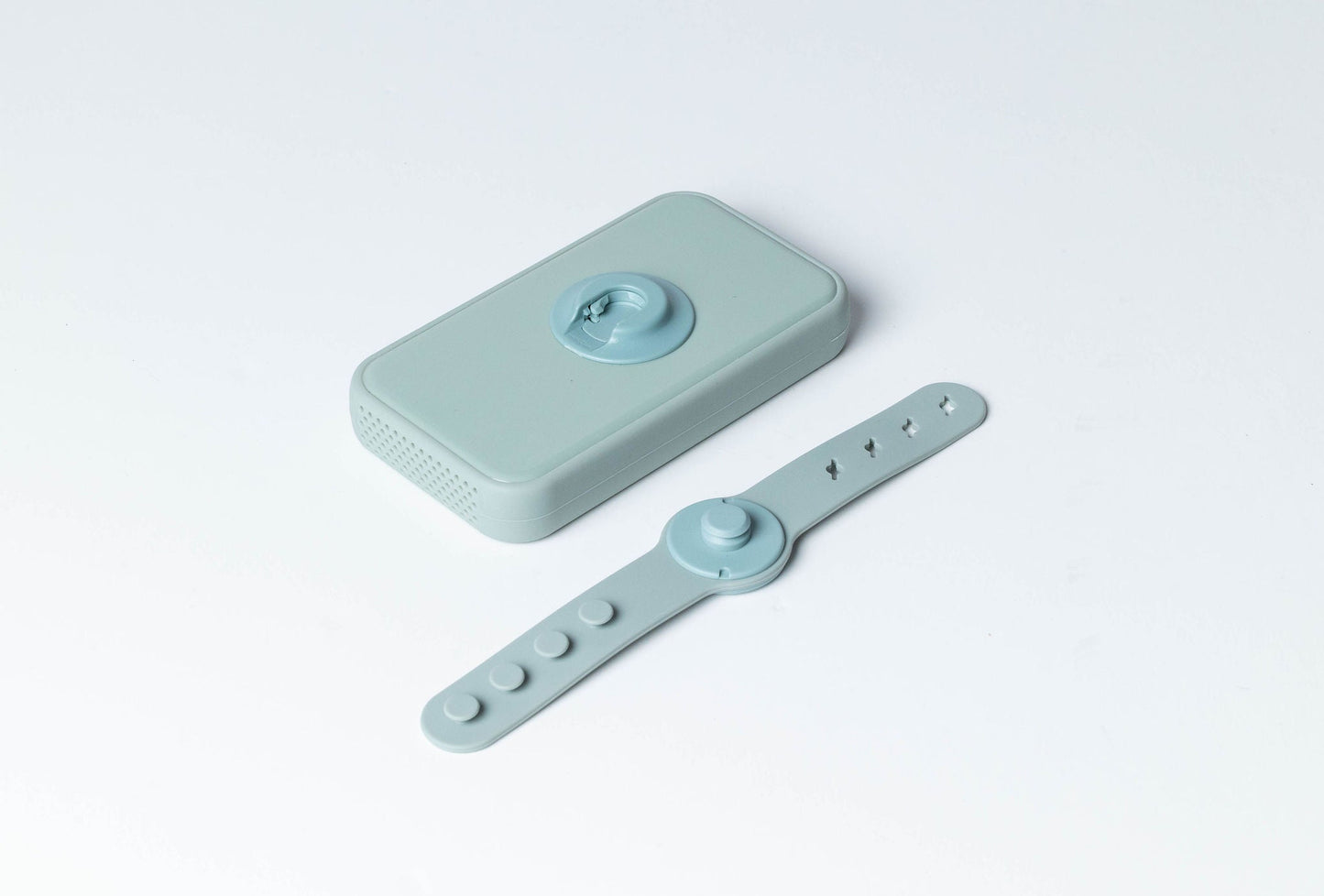 Dreamer™ baby sound machine in sage green with adjustable silicone magnetic strap