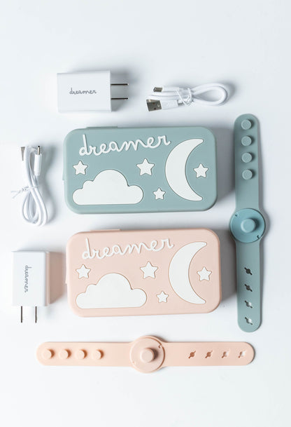 Dreamer™ Duo bundle box contents — two baby sound machines with magnetic straps, USB-C chargers, and accessories